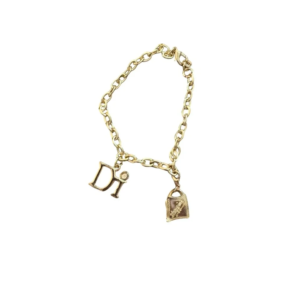 Diamonds International gold tone